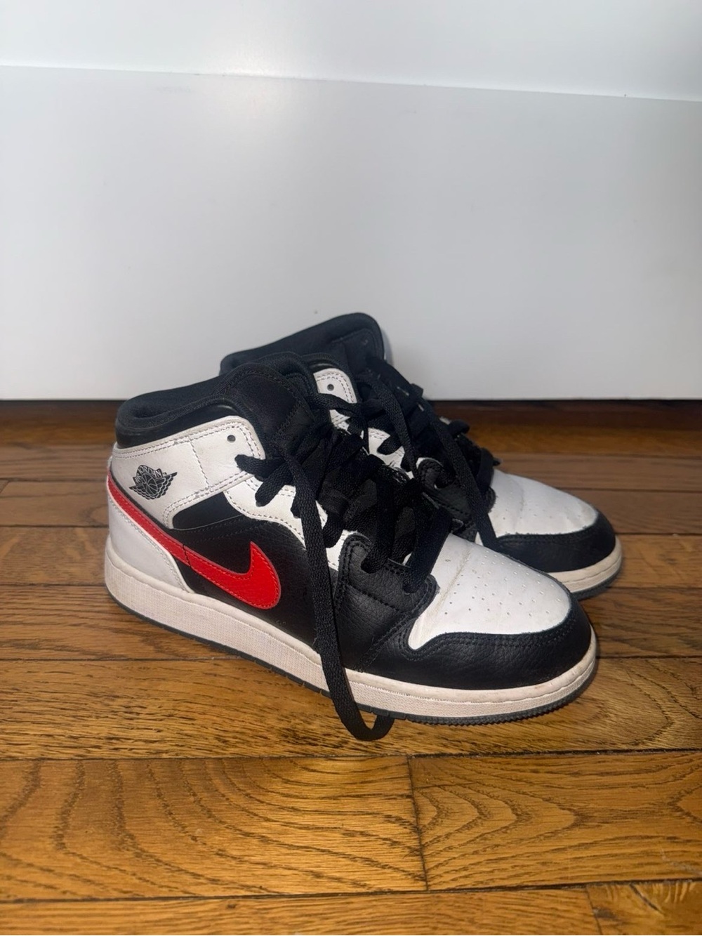 Nike Black White and Red Mid-Top Sneakers